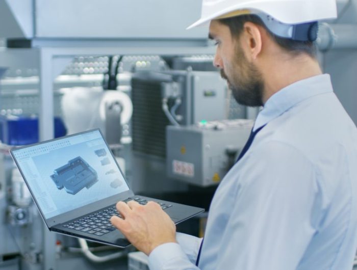 Chief,Engineer,In,The,Hard,Hat,Holds,Laptop,With,3d